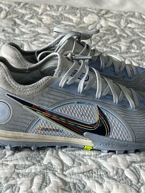 Nike Men’s Light Gray Mercurial Athletic Soccer Shoes with Multicolor Swoosh